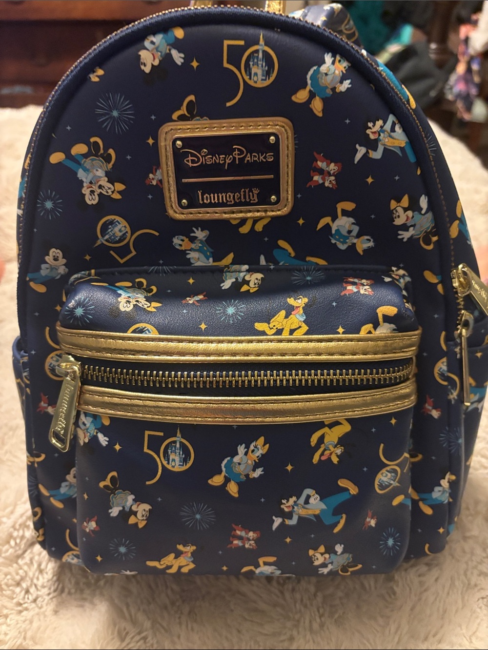 Loungefly Navy and Gold Disney Parks 50th Mini Backpack